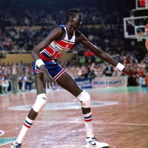 Manute Bol Height: The Secret Behind His 7'7" Frame - iEnglish Status